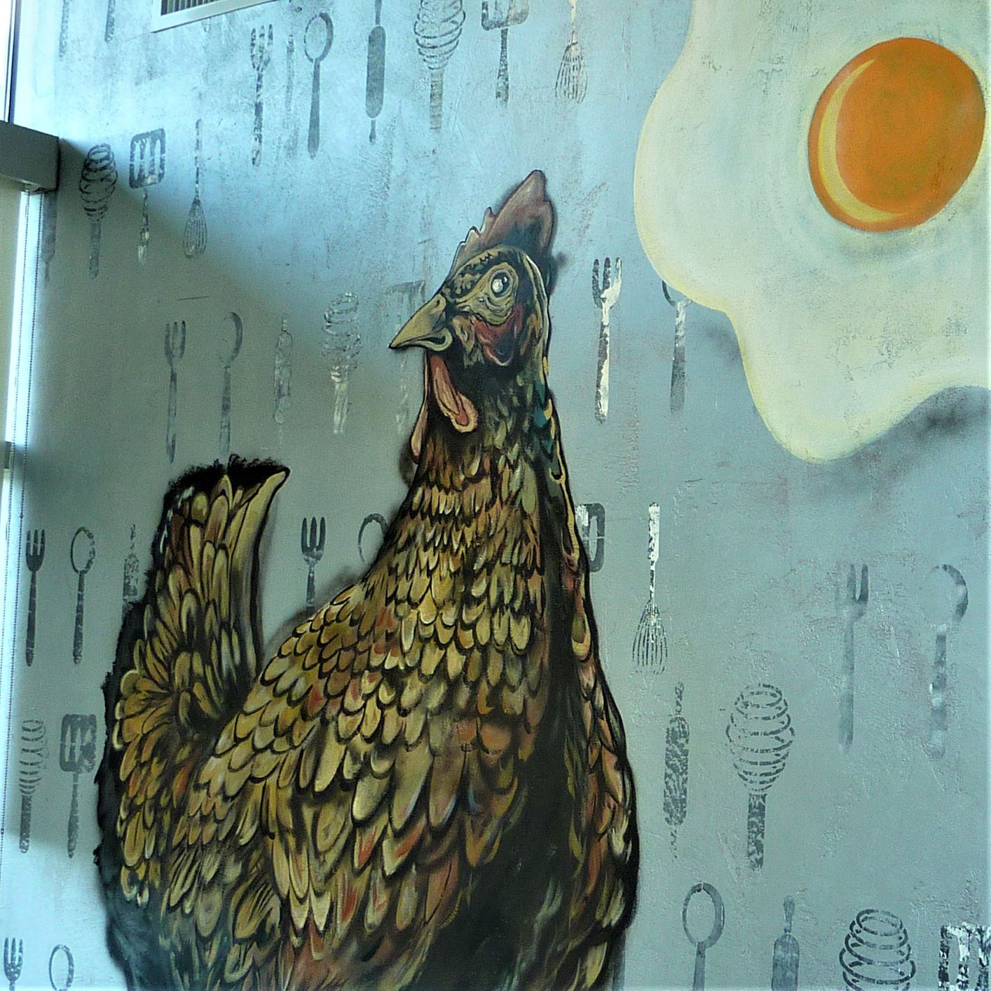 Chicken and egg art at CRACK'D Kitchen & Coffee in Andover, Mass.