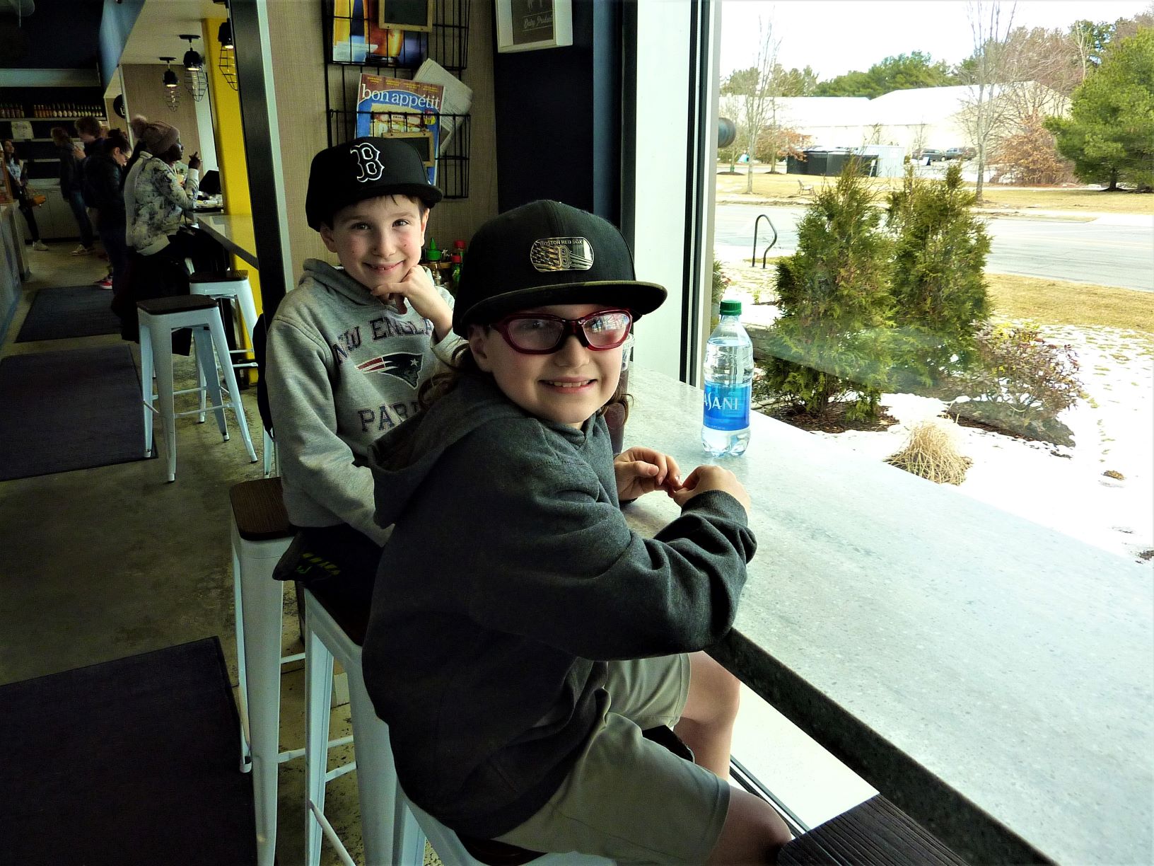 Kids at  dining room counter at CRACK'd in Andover, Mass.