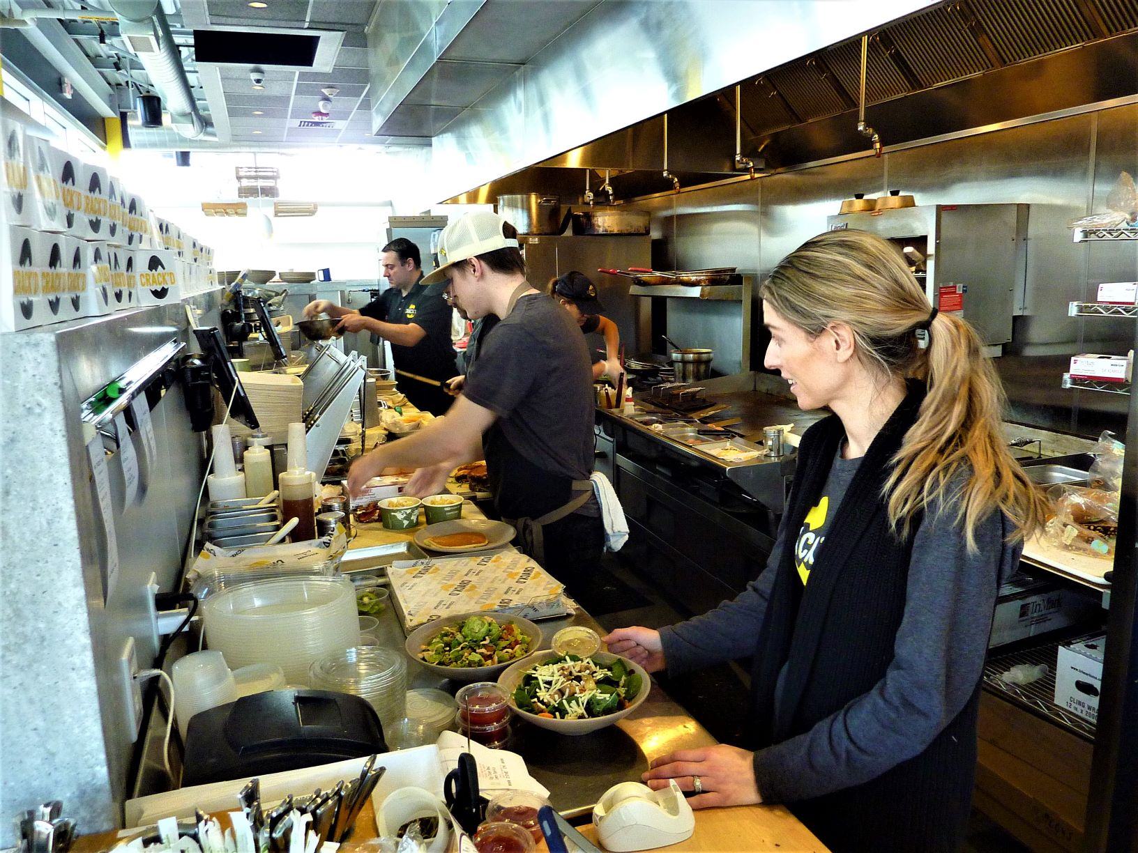 Open kitchen at CRACK'D in Andover, Mass.