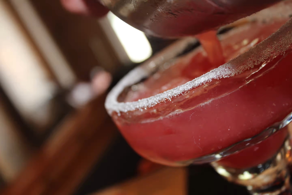 From The Alamo Texas BBQ and Tequila Bar in Brookline, NH: House tequila, triple sec, house made sour mix add watermelon, peach, raspberry, strawberry or mango