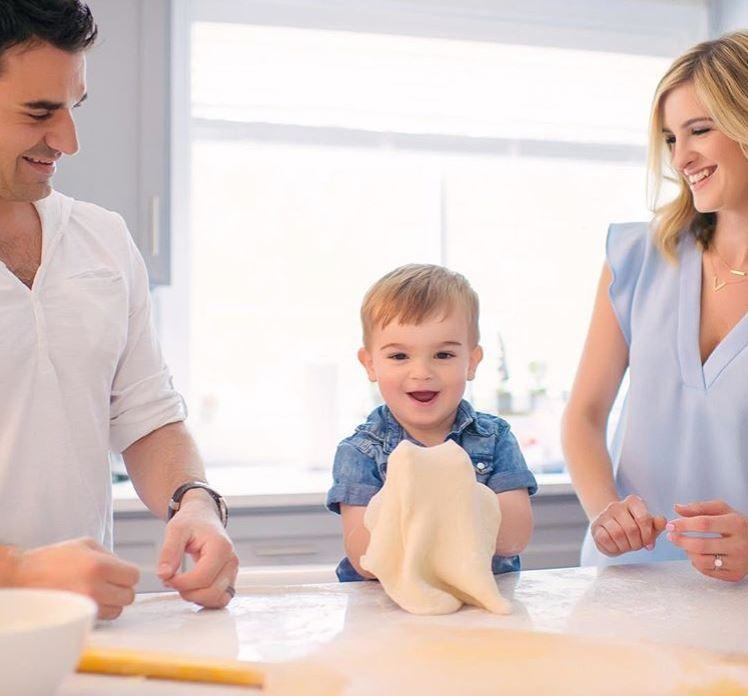 Dylan Fabiano helps his parents Dom and Shannon make pizza.