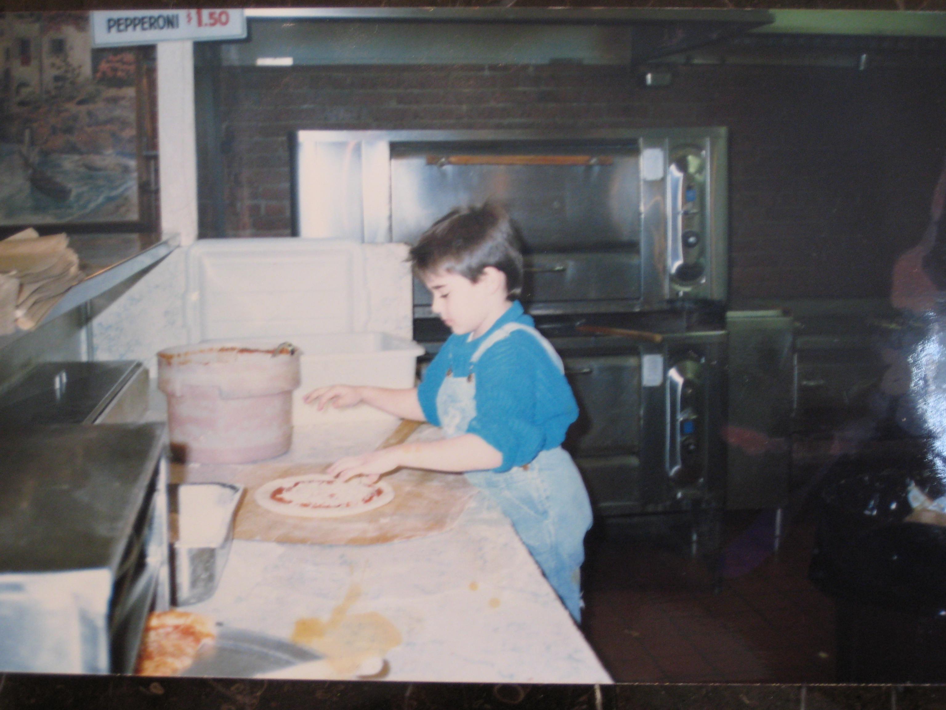 Arturo's Ristorante owner Dom Fabiano making pizza at five-years-old at his dad's restaurant.