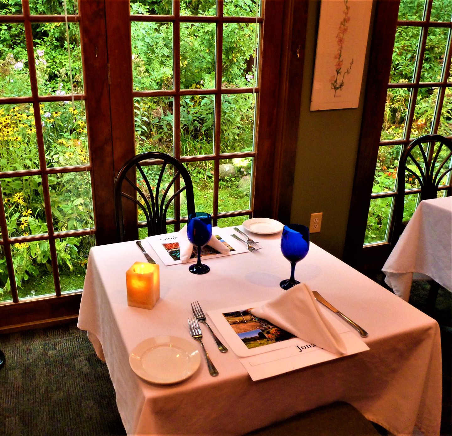 Dining room by the gardens at Jonathan's Restaurant in Ogunquit, Maine.