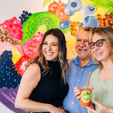 Marcieli Pastorio with her mom and dad at The Juice Bar in Norwood, MA.