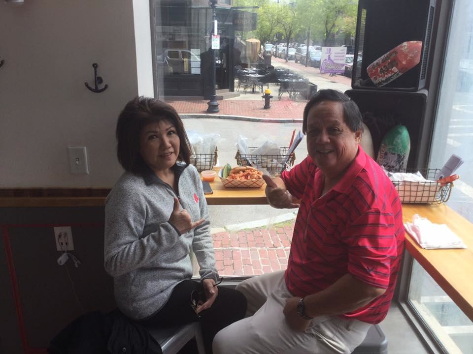 Hawaiian couple enjoys lobster rolls at Lobstah On A Roll in Boston, Mass.
