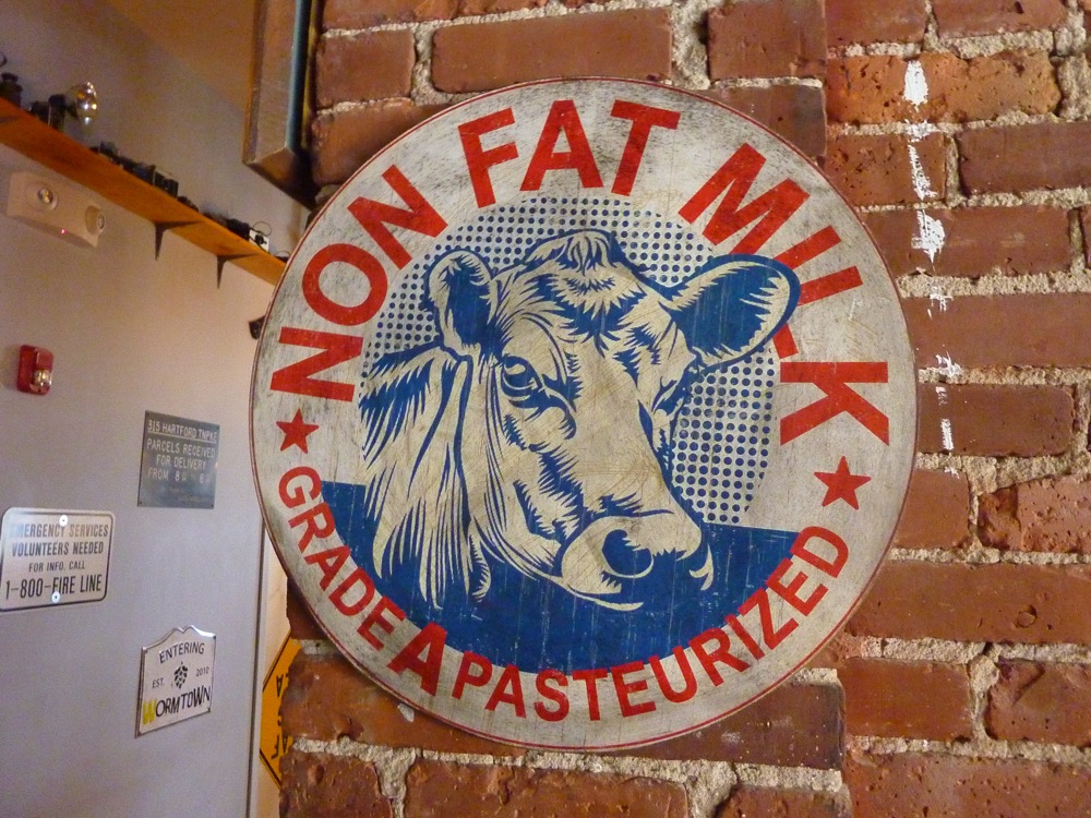 Old dairy sign on the wall at Maddi's Cookery & TapHouse in Worcester, Massachusetts,