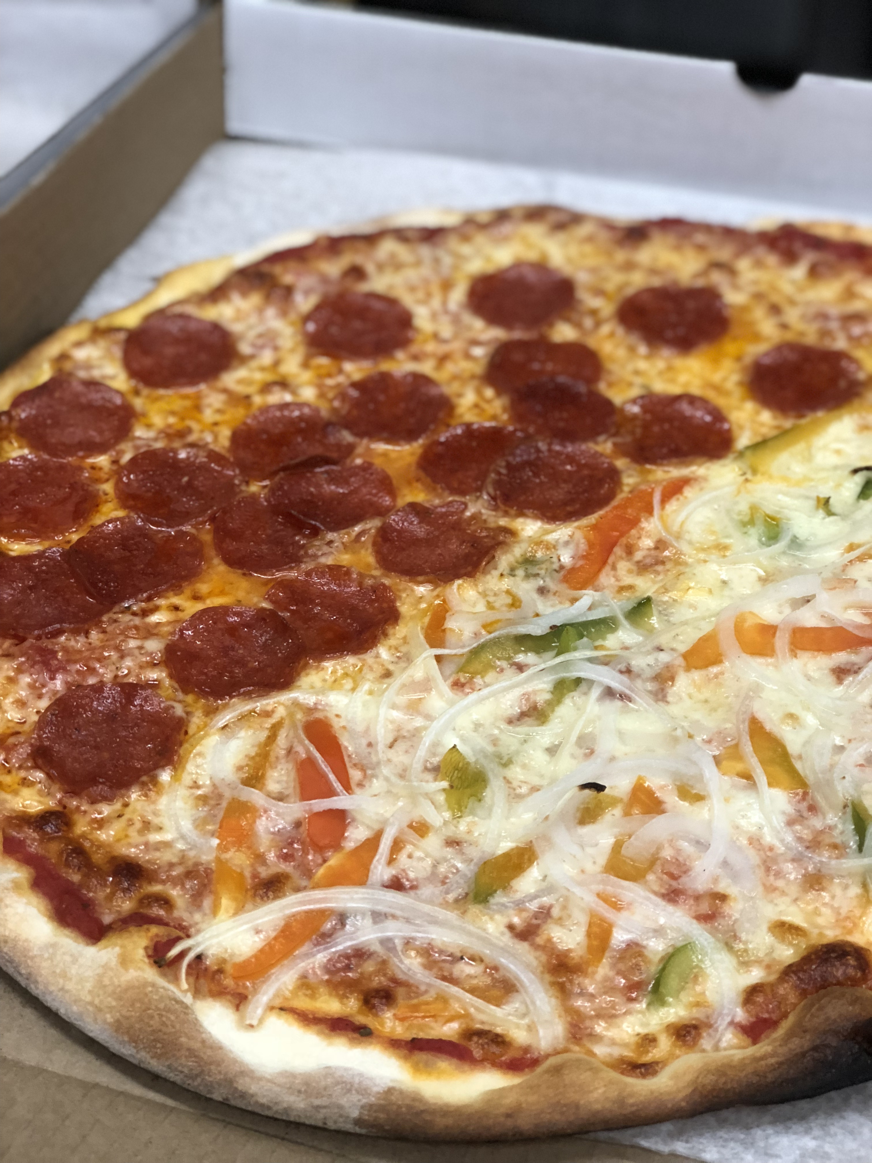 Pizza from the Pleasant Cafe in Roslindale, Mass.,