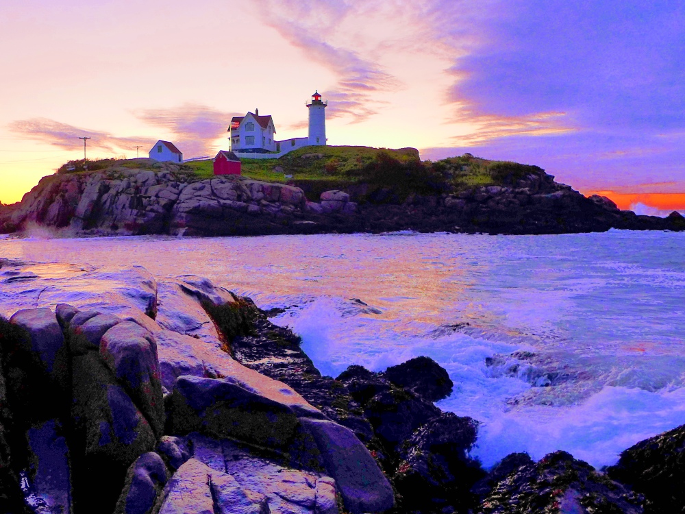 The start of a new day at Nubble Lighthouse in York Beach, Maine.