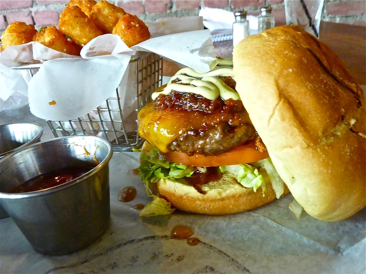Burger and garlic tater tost with homemade ketchup from Tessie's Bar & Kitchen in Walpole, Mass.