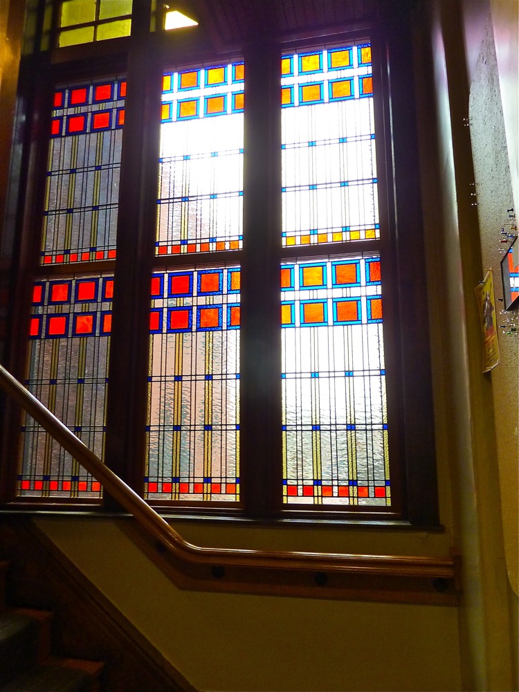 Stained windows by the staircase at Thornes Marketplace in Northampton, Mass.