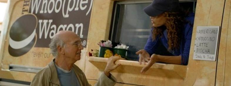 Larry David buys a whoopie pie from The Whoo(pie) Wagon at the Topsfield Fair in Topsfield, Mass.